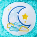 Belly Badge on the Care Bears Medium Cozy Bedtime Bear Plush