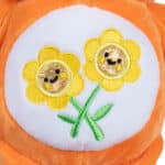 Close up of the Belly Badge on the Friend Bear from the Fun Size Sparkle Collection