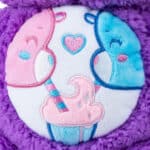 Close up of Cozy Share Bears Belly Badge