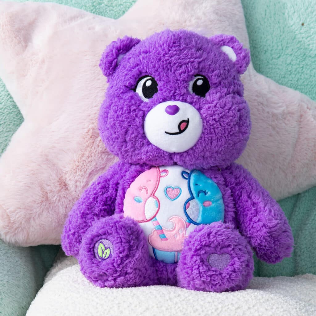 Front facing view of Cozy Share Bear sitting down