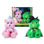 Love-a-Lot Bear as Glinda and Good Luck Bear as Elphaba included in the Care Bears x Wicked 2-Pack Boxed Set in and out of packaging