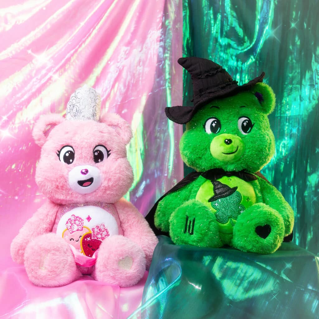 Love-a-Lot Bear as Glinda and Good Luck Bear as Elphaba included in the Care Bears x Wicked 2-Pack Boxed Set