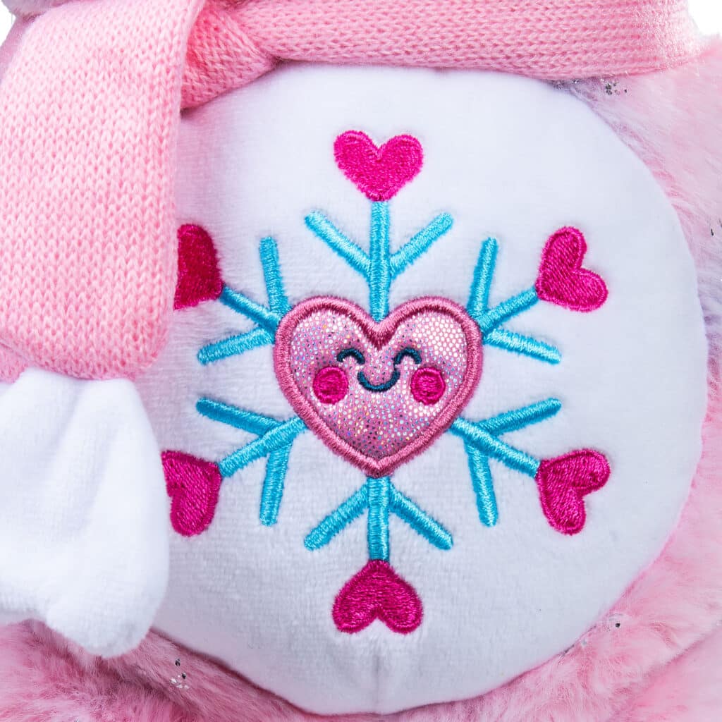 Belly Badge on the Care Bears Collector's Edition Snowflake Sparkle Bear