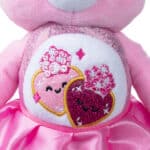 Close up of the Belly Badge on the Love-A-Lot Bear as Glinda